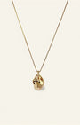 Gold necklace with a teardrop-shaped pendant on a light beige background