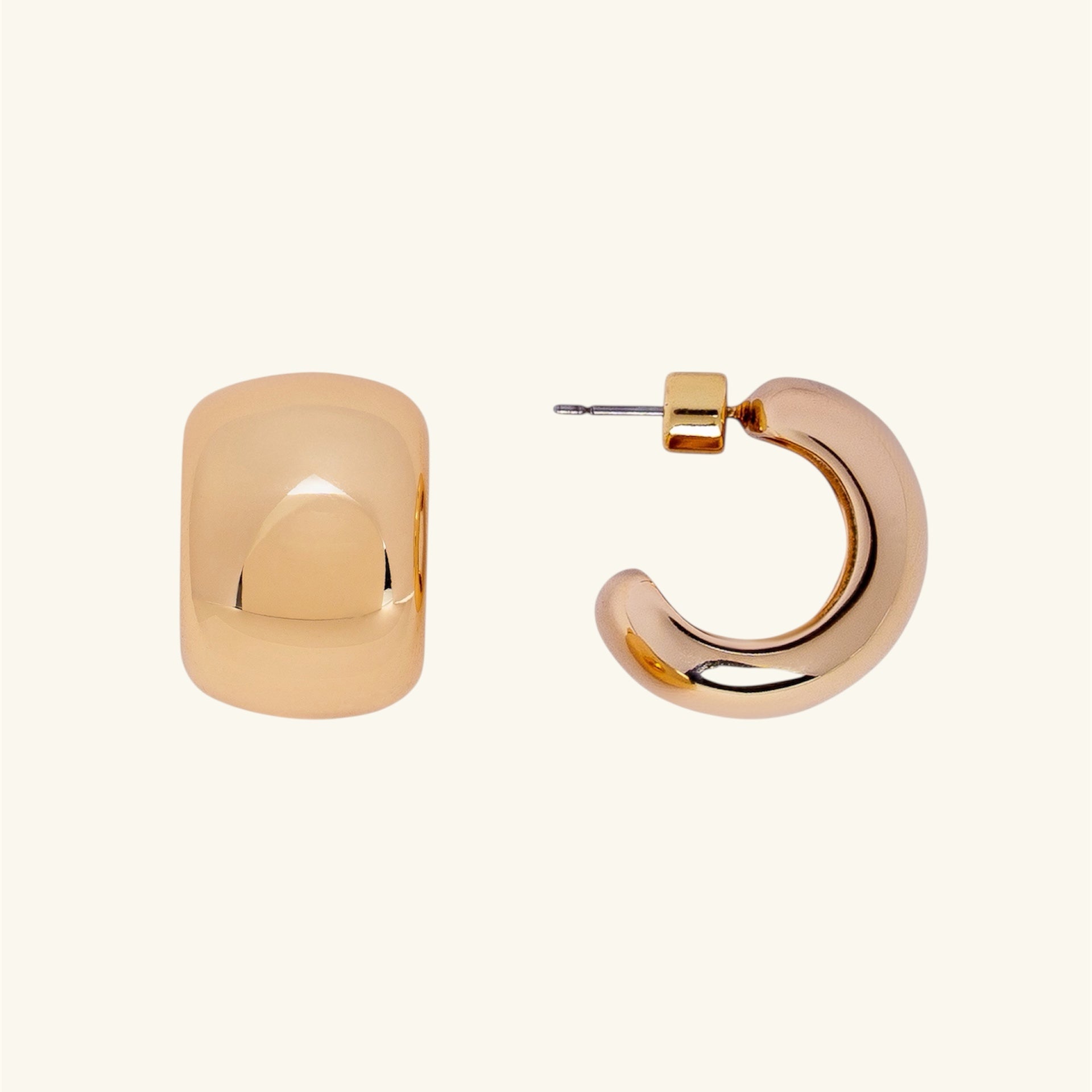 Gold hoop earrings on a white background